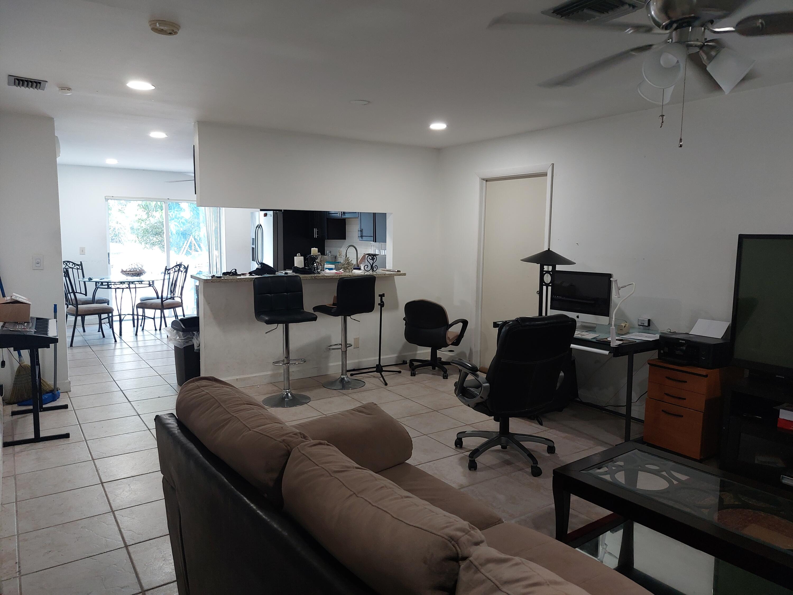 5928 Westfall Road Lake Worth, FL 33463 - Photo 3 of 14 kitchen view from Living room