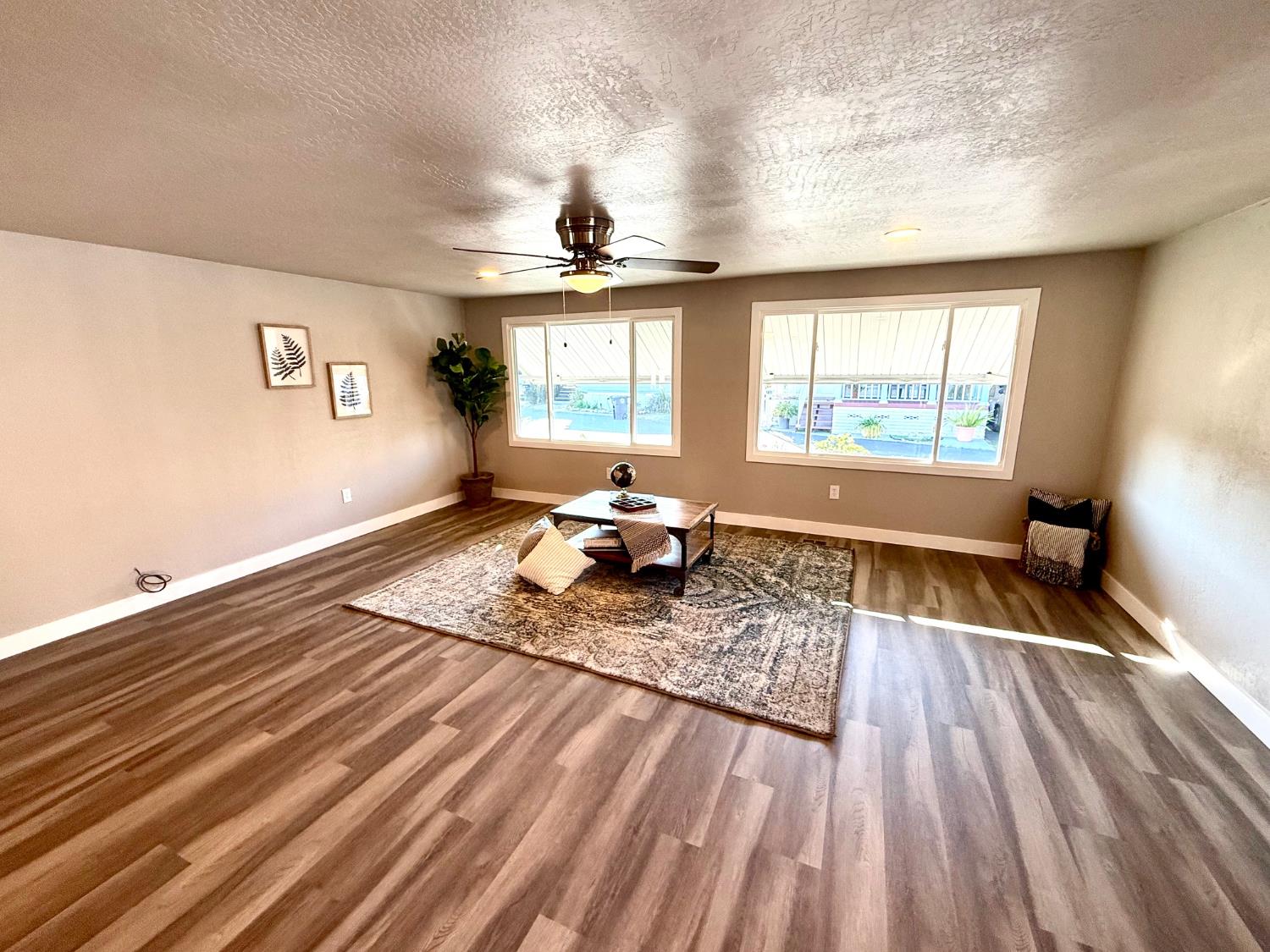 142 Sage Street Citrus Heights, CA 95621 - Photo 5 of 19 a very nice looking room with a large window