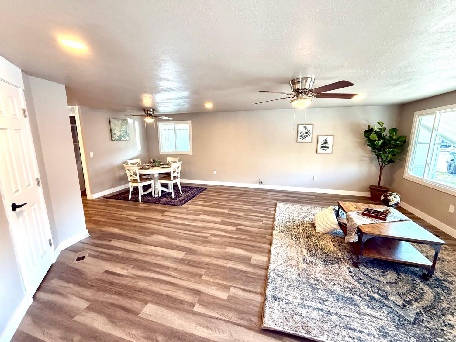 142 Sage Street Citrus Heights, CA 95621 - Photo 6 of 19 a living room with furniture and a chandelier