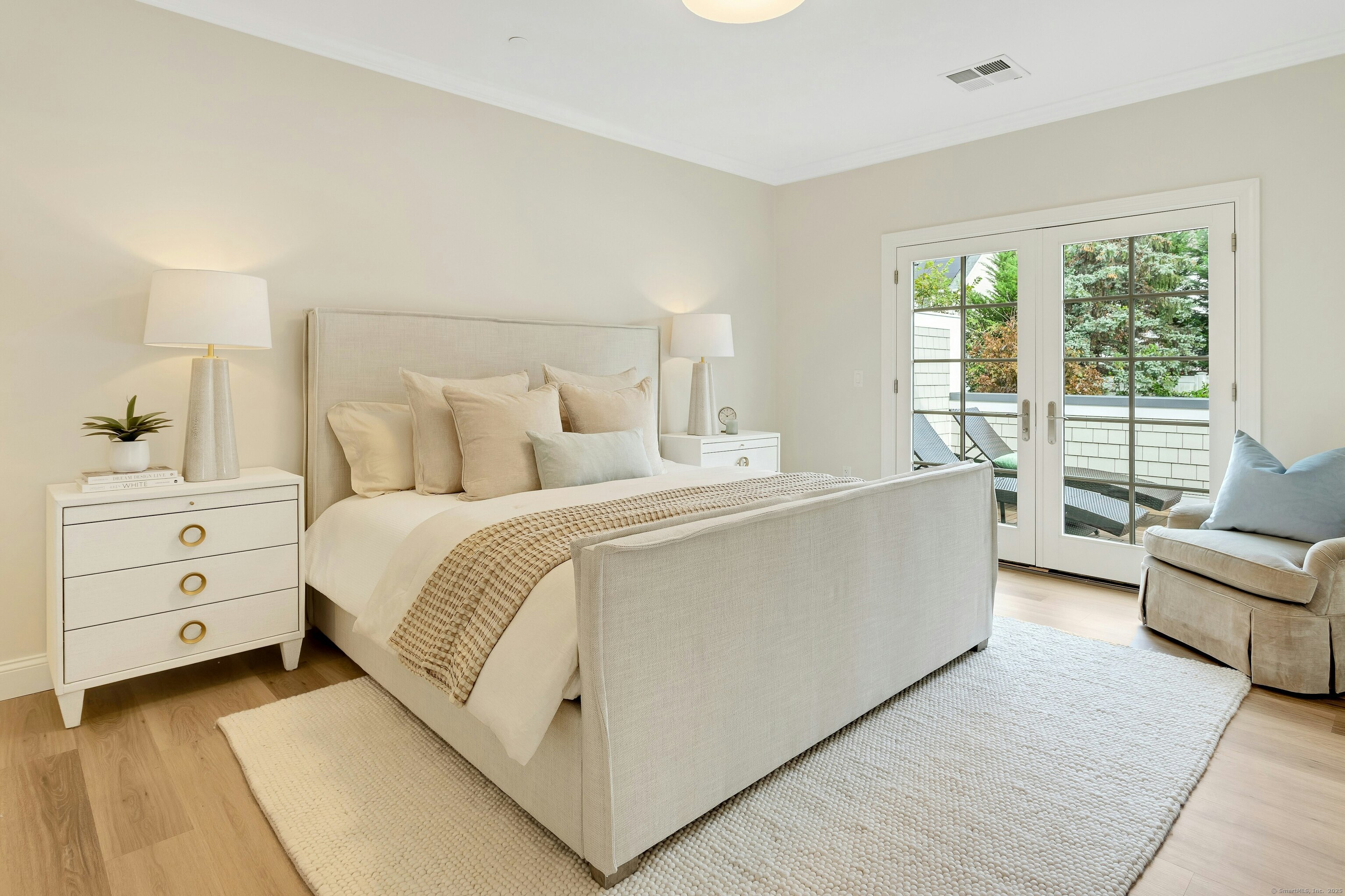 340 Heights Road, Unit 319 Darien, CT 06820 - Photo 11 of 21 a room with a bed and a couch