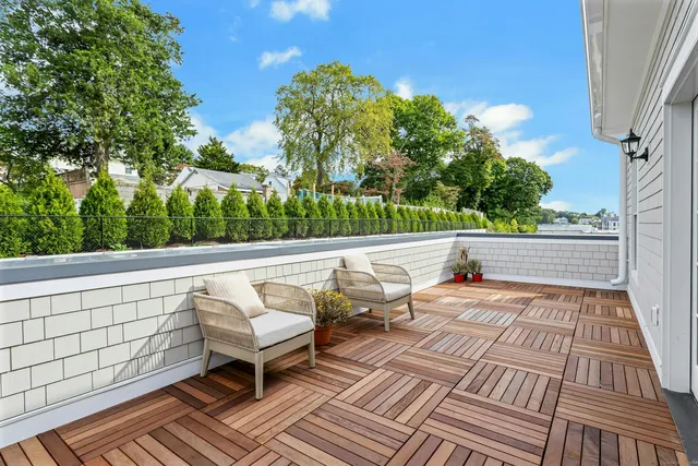 a view of roof deck with patio