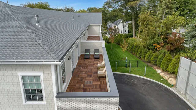a view of a yard from a balcony