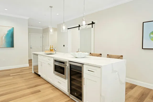 a kitchen with a stove and a sink
