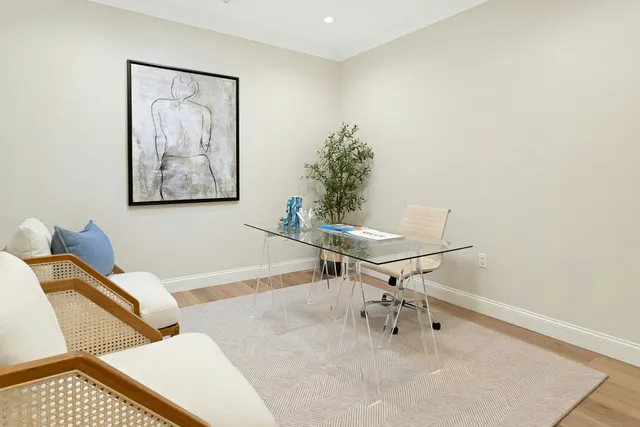 a view of a workspace with furniture