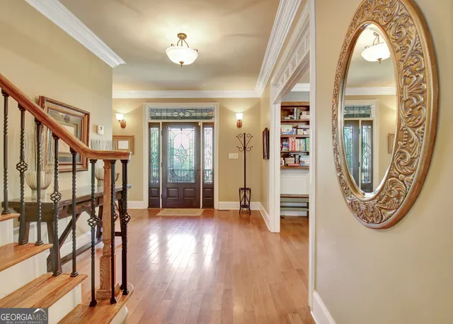 a bed room with a bed and a large mirror