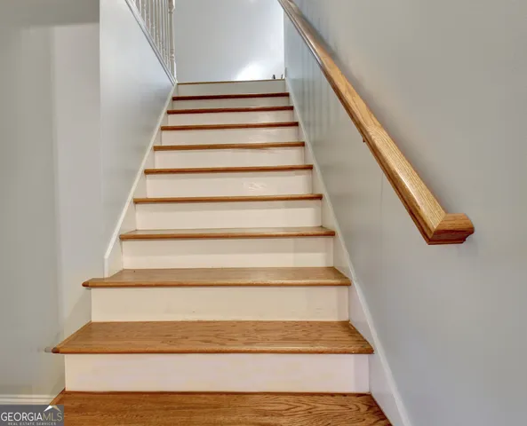 a view of a park with large trees