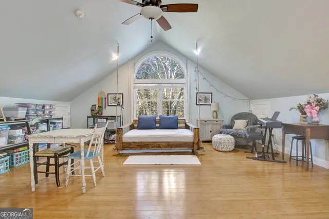 a view of outdoor space with swimming pool and trees