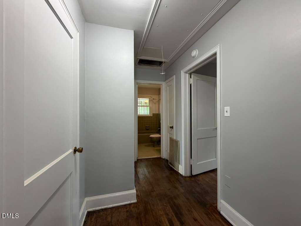 1419 Leon Street Durham, NC 27705 - Photo 11 of 23 a view of a hallway with wooden floor