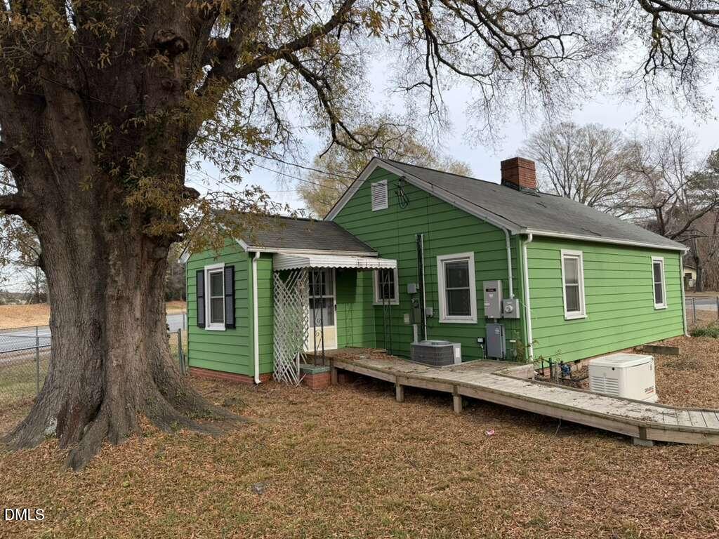 1419 Leon Street Durham, NC 27705 - Photo 3 of 23 a front view of a house with garden