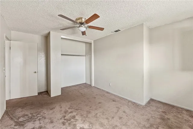 a view of a park with swings and slides