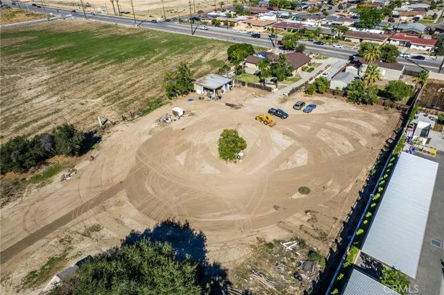 an aerial view of a house with a ocean view