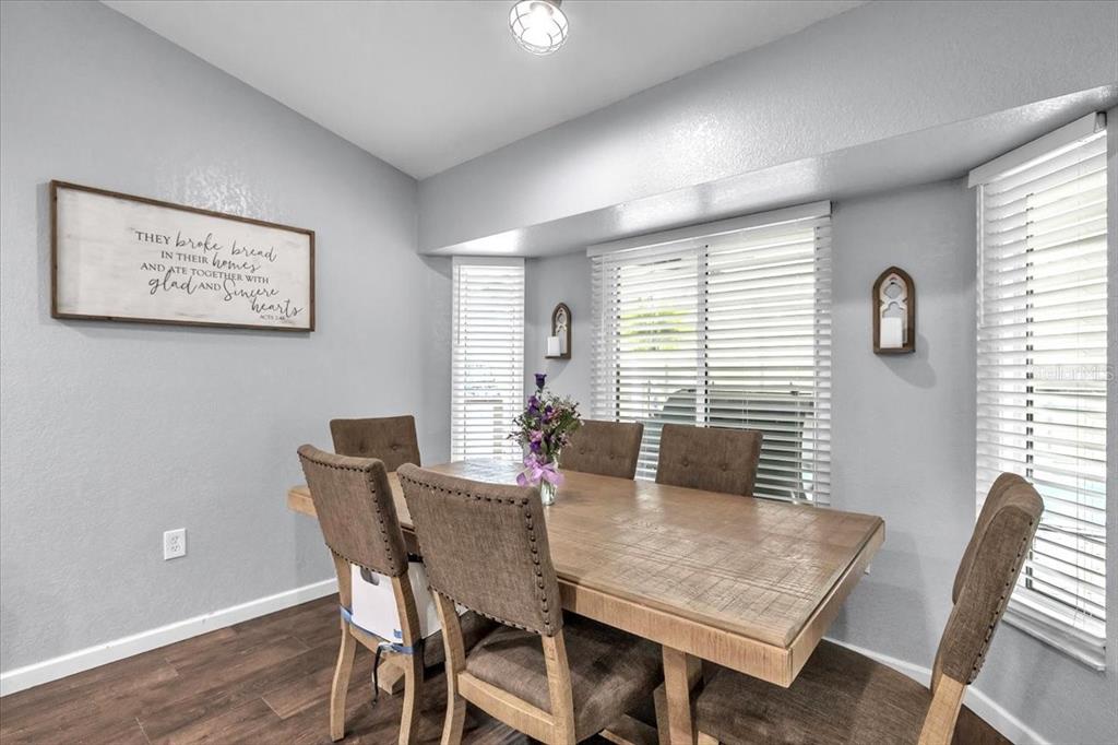29350 Goodhue Street Punta Gorda, FL 33982 - Photo 11 of 21 a view of a dining room with furniture and window