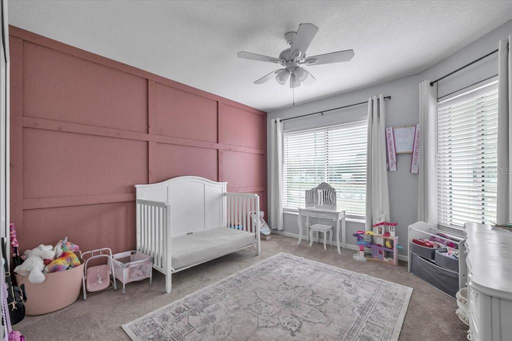 29350 Goodhue Street Punta Gorda, FL 33982 - Photo 14 of 21 a living room with furniture and white walls