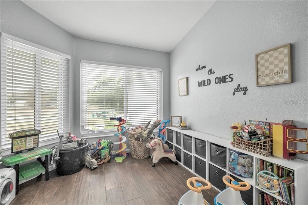 29350 Goodhue Street Punta Gorda, FL 33982 - Photo 17 of 21 a bedroom with furniture and a window