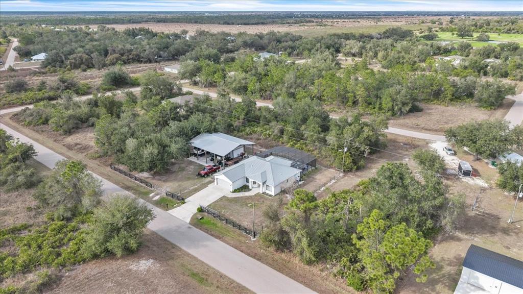 29350 Goodhue Street Punta Gorda, FL 33982 - Photo 4 of 21 an aerial view of a house with a yard