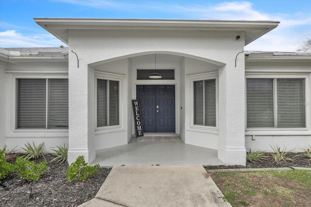 29350 Goodhue Street Punta Gorda, FL 33982 - Photo 5 of 21 a view of a house with potted plants