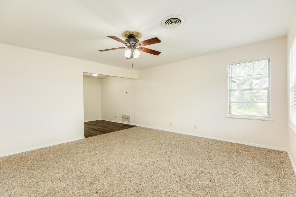 837 Pin Money Street Clute, TX 77531 - Photo 12 of 24 a view of an empty room with a window