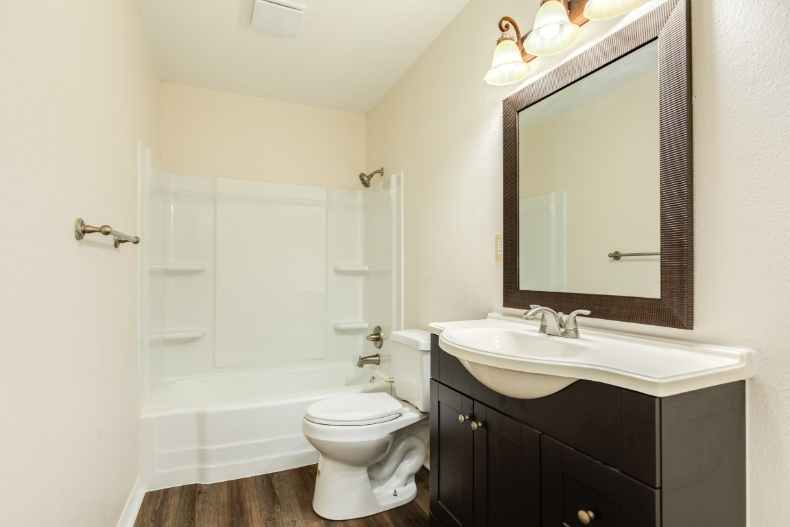 837 Pin Money Street Clute, TX 77531 - Photo 24 of 24 a bathroom with a sink and a mirror