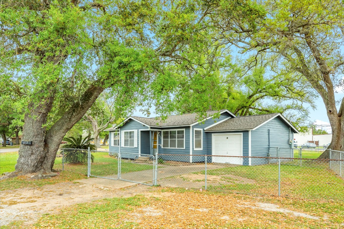 837 Pin Money Street Clute, TX 77531 - Photo 3 of 24 a house with swimming pool in front of it