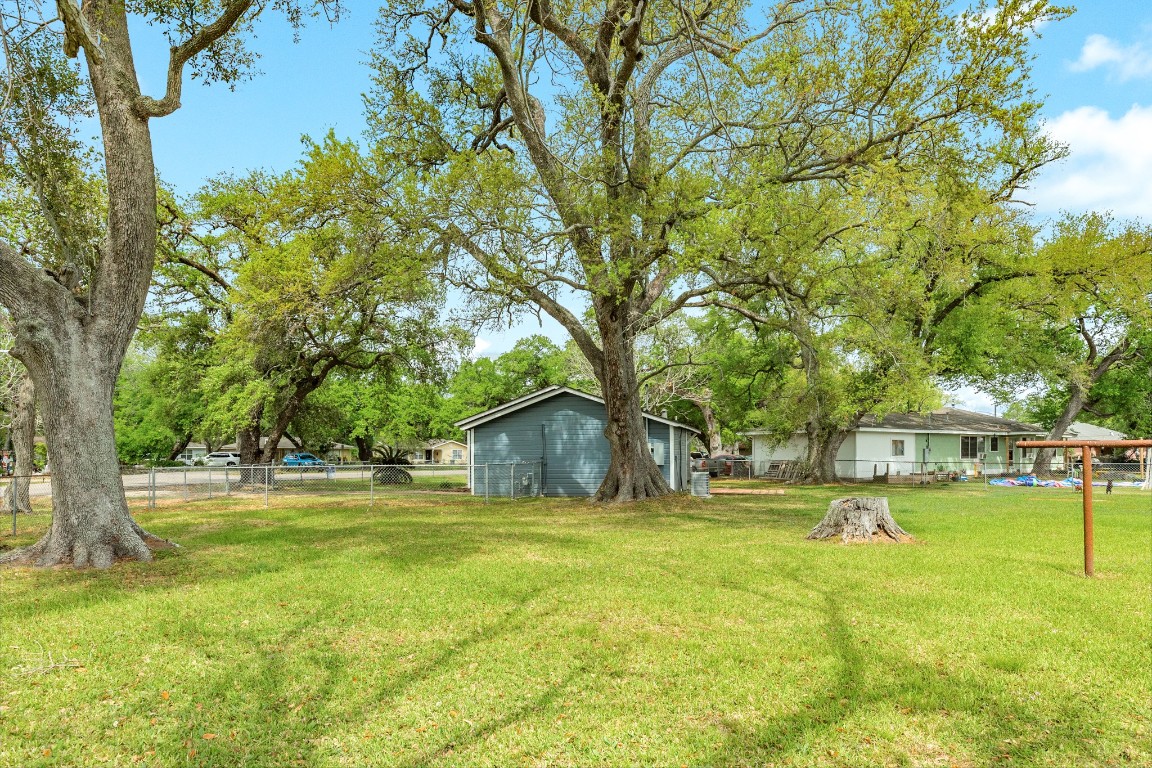 837 Pin Money Street Clute, TX 77531 - Photo 6 of 24 a view of a house with swimming pool and sitting area
