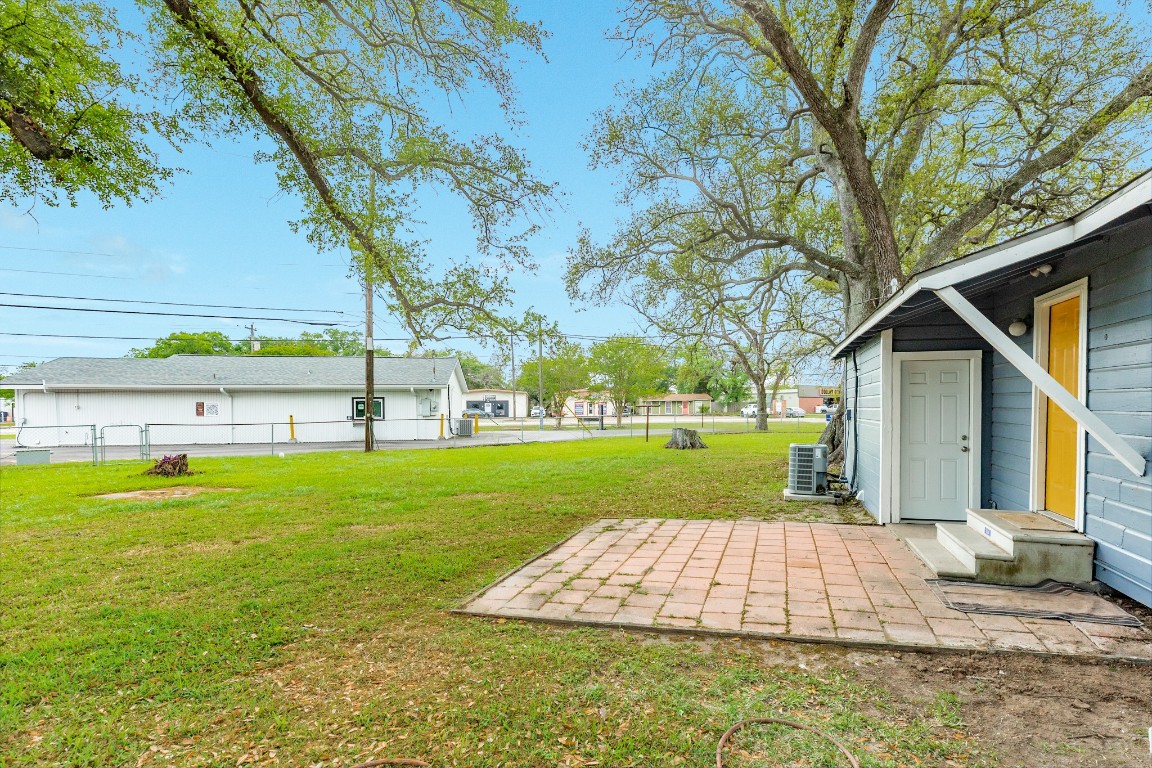 837 Pin Money Street Clute, TX 77531 - Photo 9 of 24 a view of a house with a yard