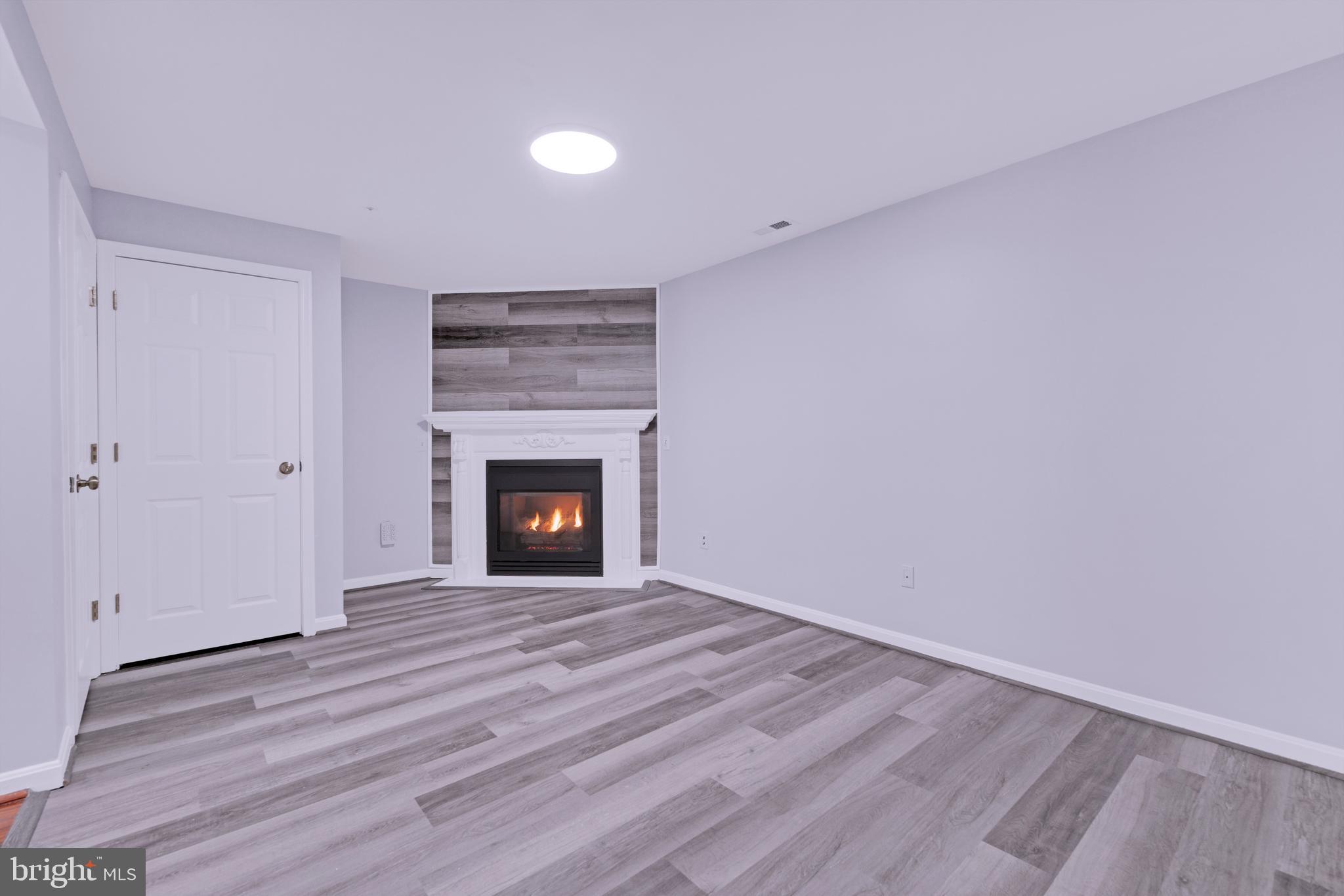 8752 Jarwood Road Rosedale, MD 21237 - Photo 8 of 33 Den with Fireplace