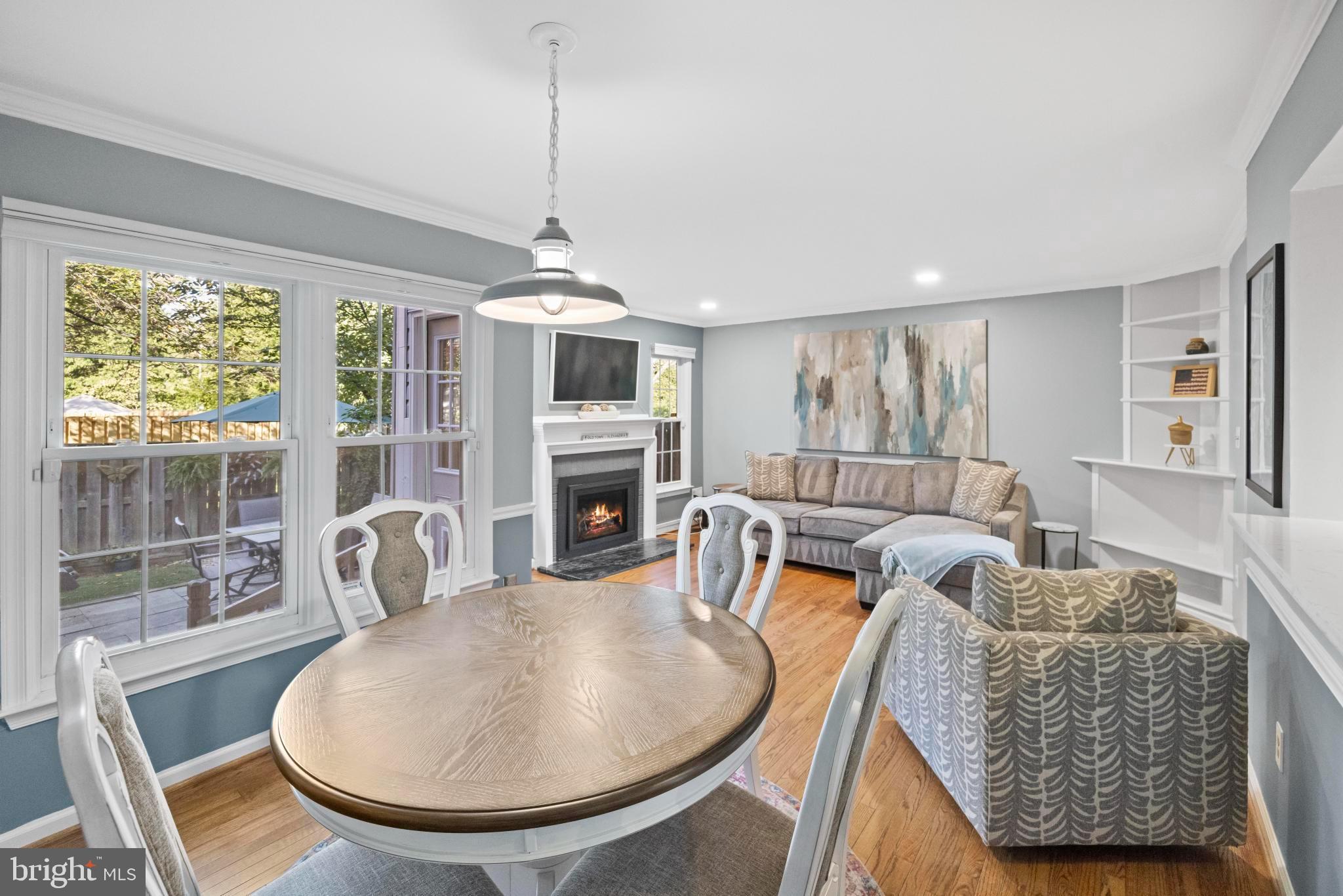 1792 Duffield Lane Alexandria, VA 22307 - Photo 14 of 50 a living room with furniture a fireplace and a chandelier