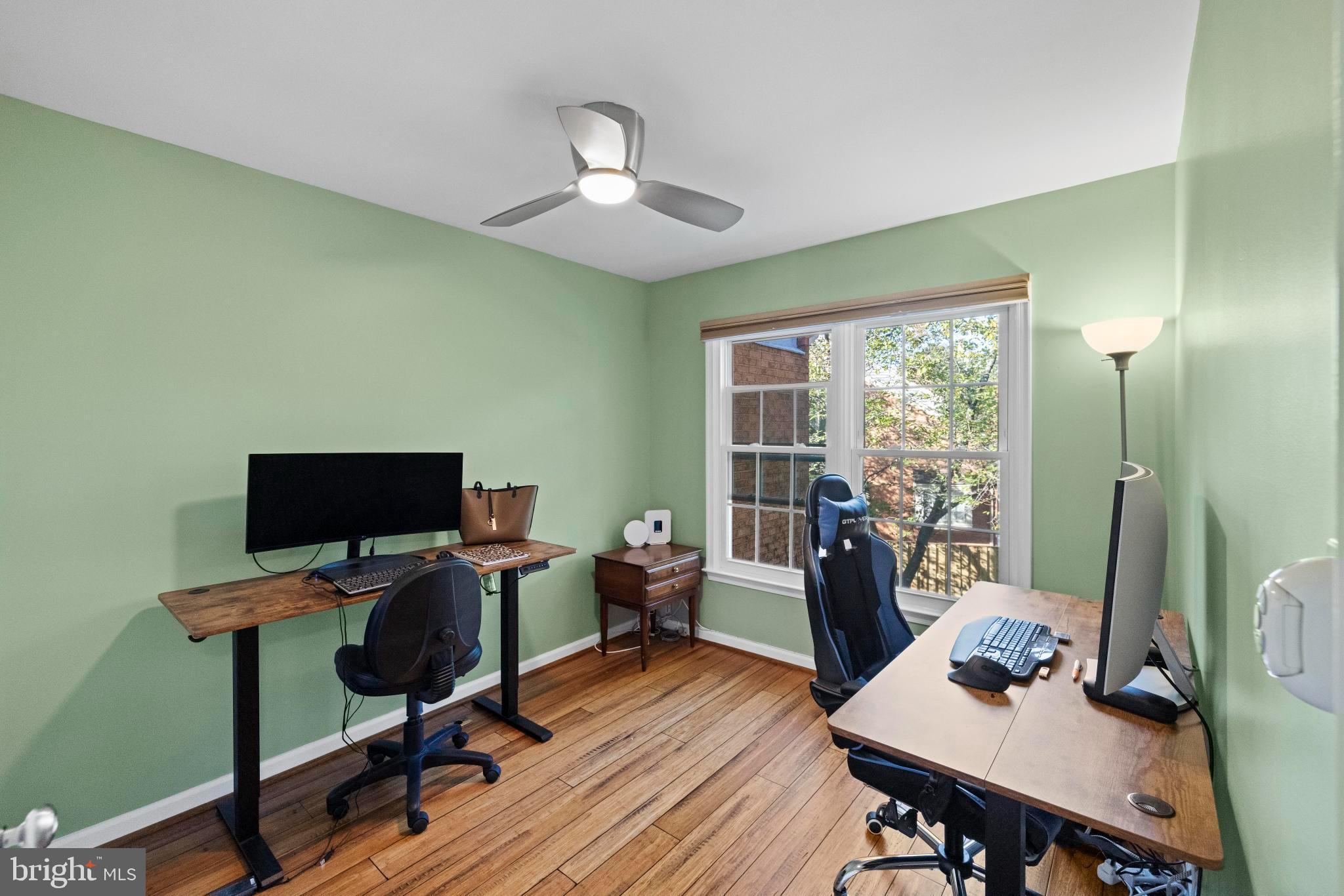 1792 Duffield Lane Alexandria, VA 22307 - Photo 23 of 50 a view of a workspace with furniture and a window