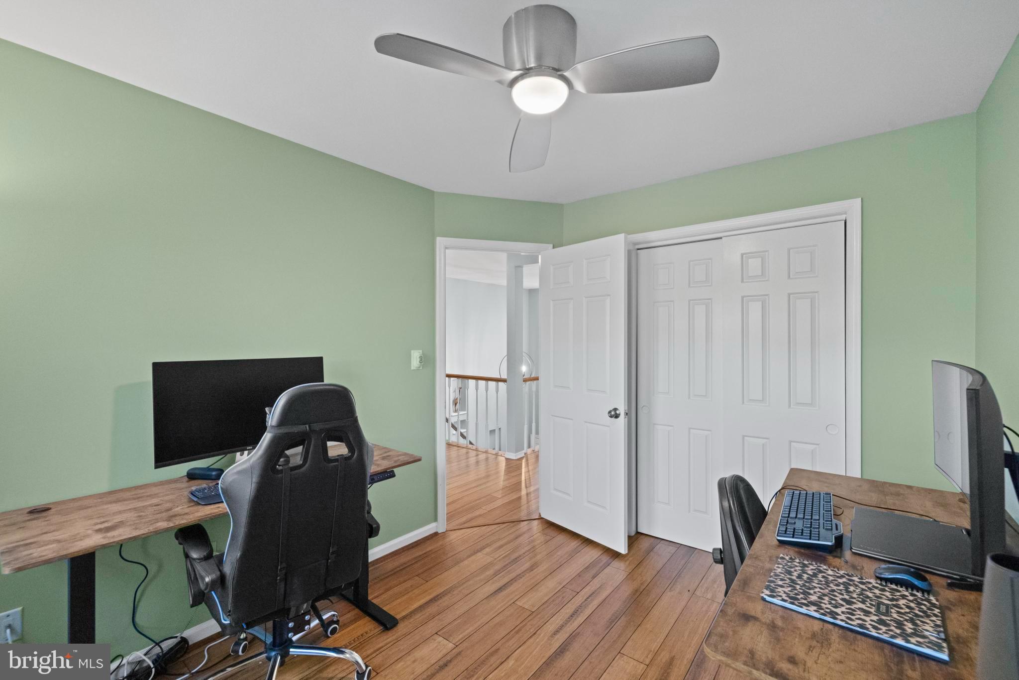 1792 Duffield Lane Alexandria, VA 22307 - Photo 24 of 50 a view of a workspace with furniture and a window