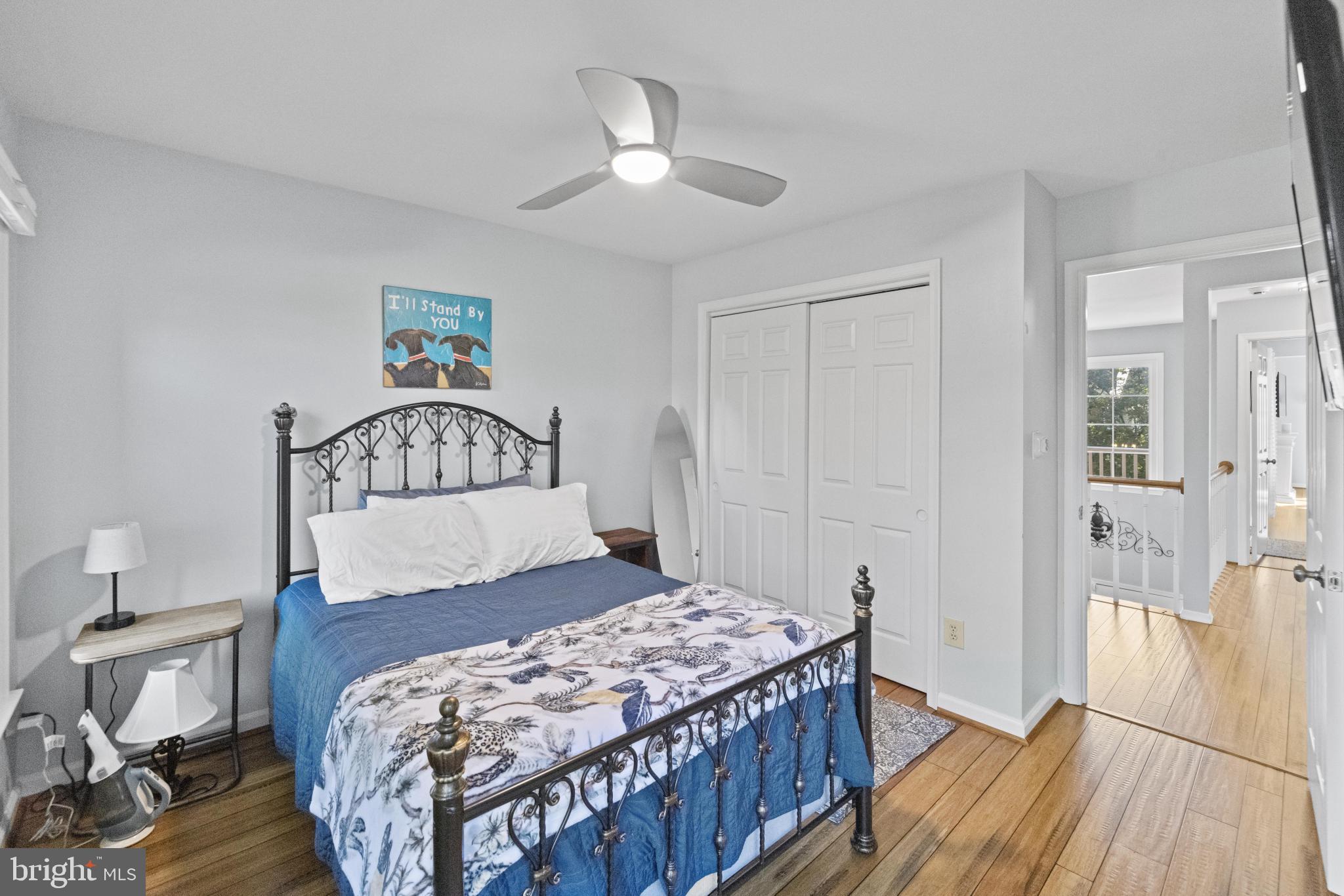 1792 Duffield Lane Alexandria, VA 22307 - Photo 26 of 50 a bedroom with a bed and wooden floor