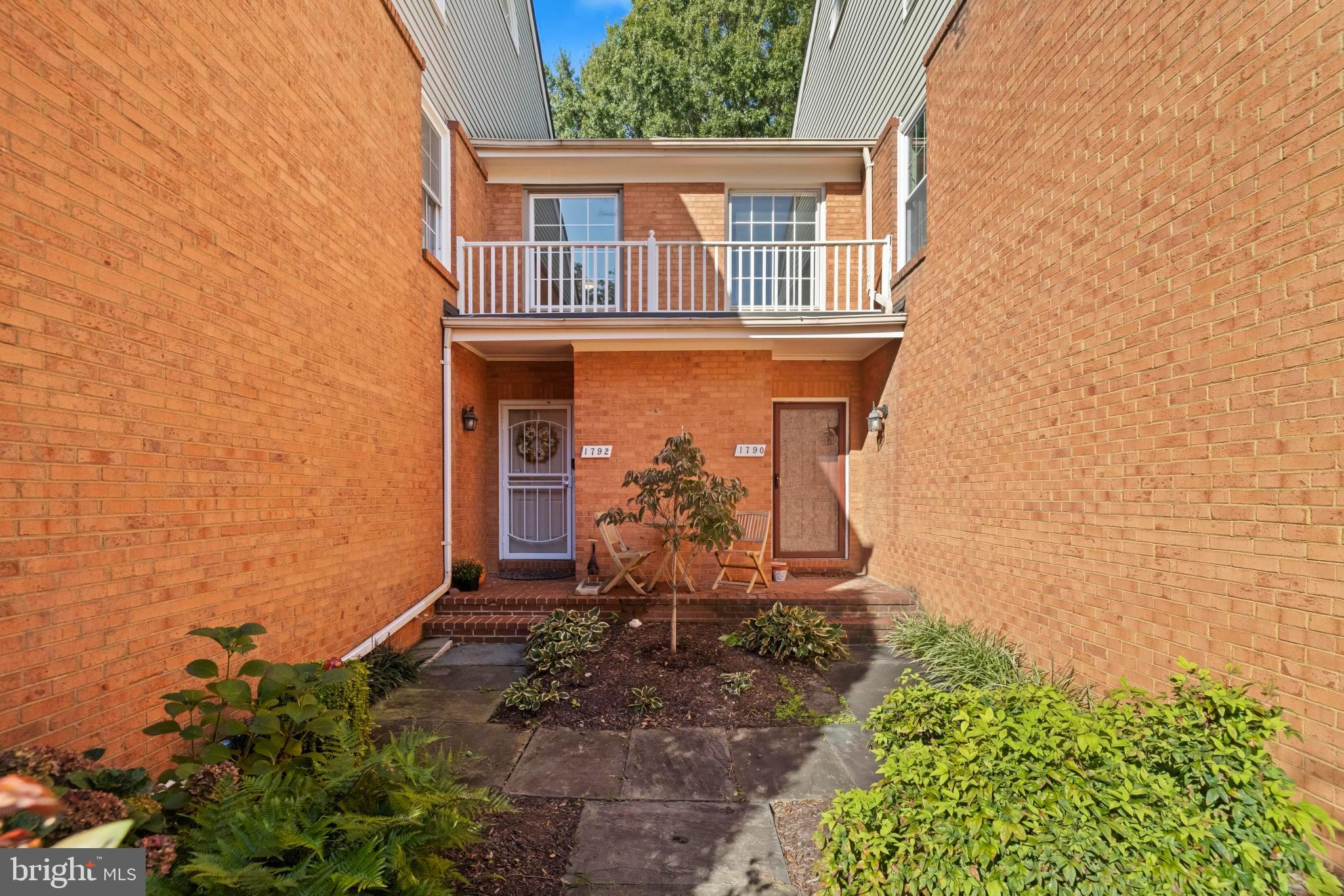 1792 Duffield Lane Alexandria, VA 22307 - Photo 3 of 50 front view of a house with a yard