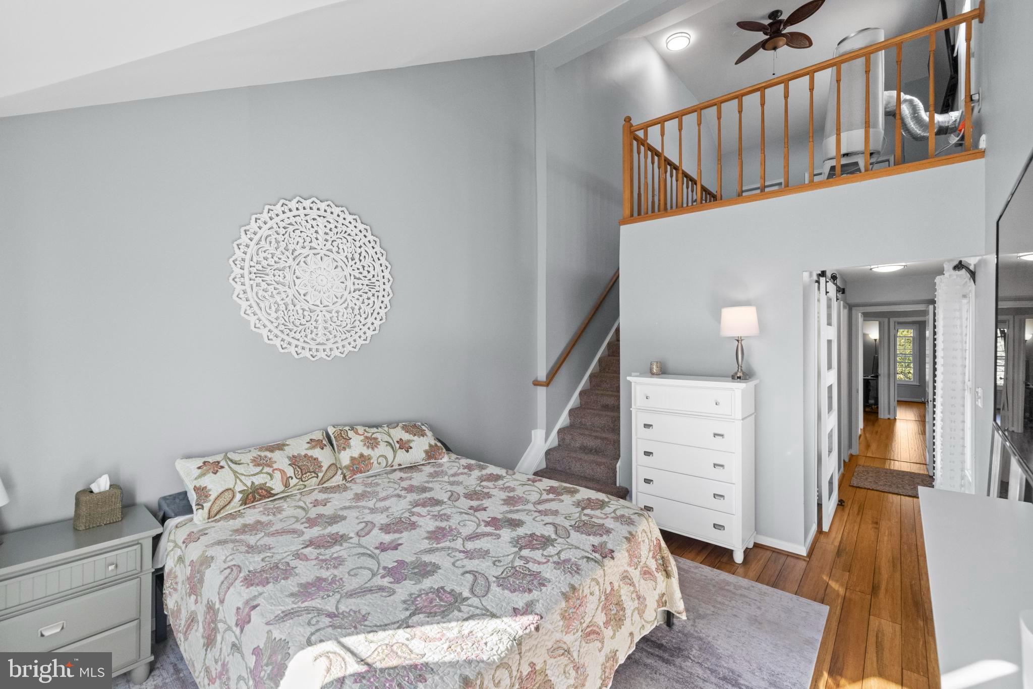 1792 Duffield Lane Alexandria, VA 22307 - Photo 34 of 50 a bedroom with a bed and wooden floor