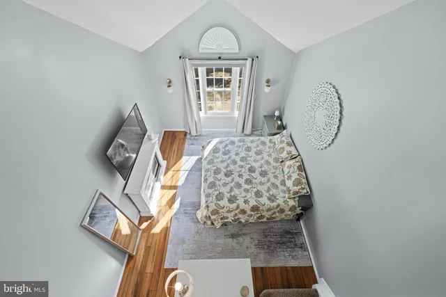 a view of a hallway with washer and dryer