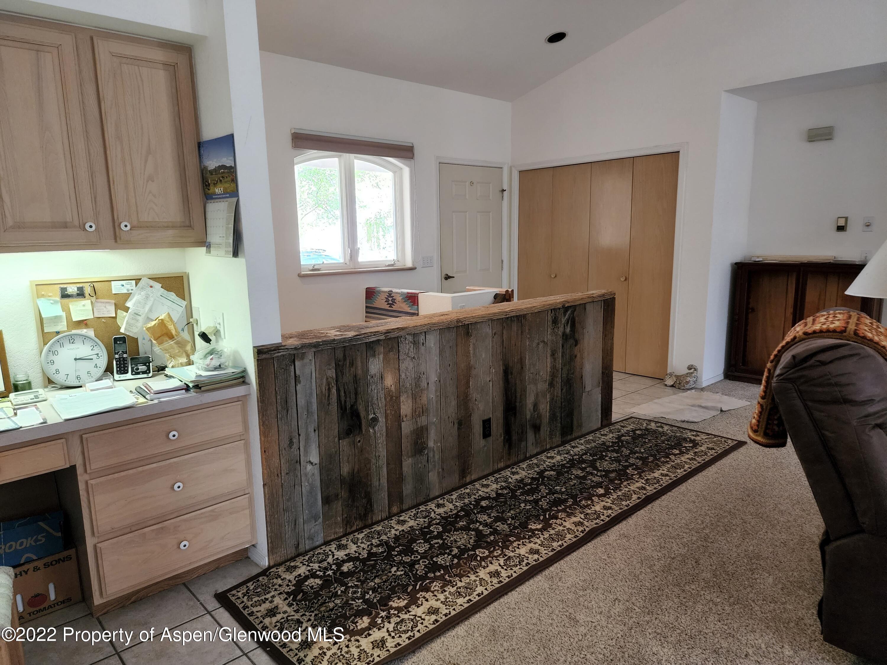 751 Latigo Loop Carbondale, CO 81623 - Photo 18 of 44 a room with painting and a lamp