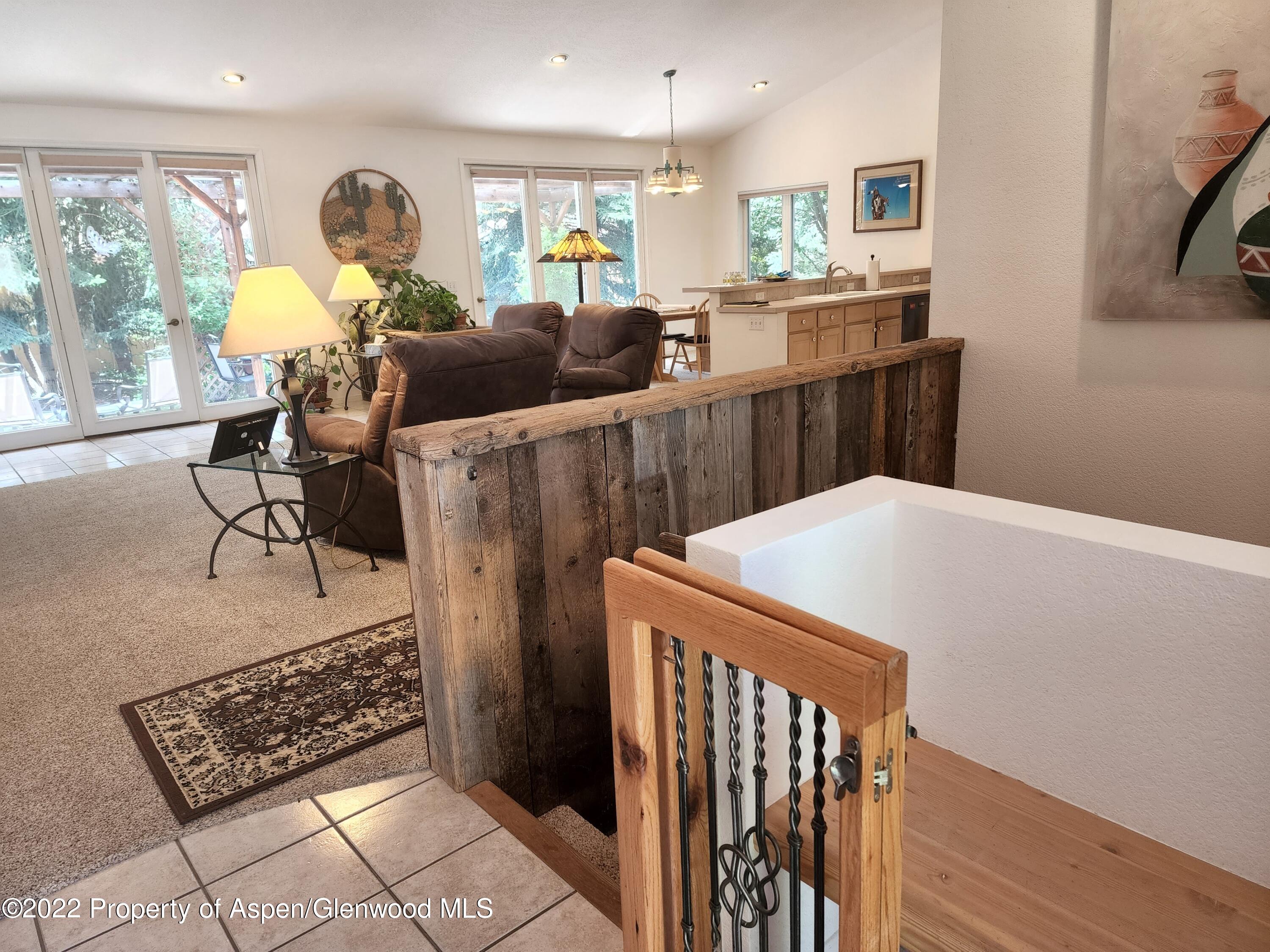 751 Latigo Loop Carbondale, CO 81623 - Photo 19 of 44 a living room with furniture and a window