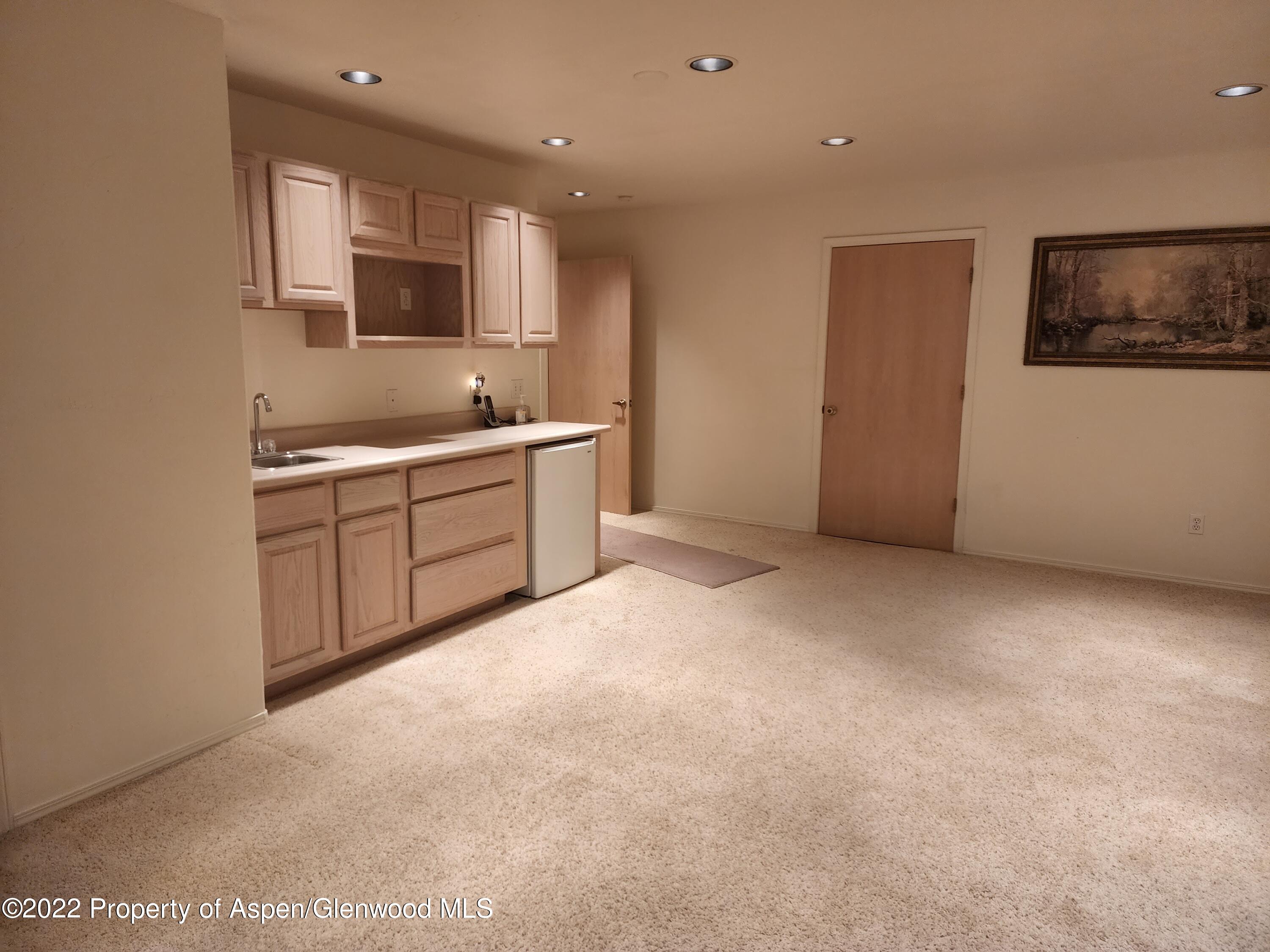 751 Latigo Loop Carbondale, CO 81623 - Photo 21 of 44 a large kitchen with cabinets