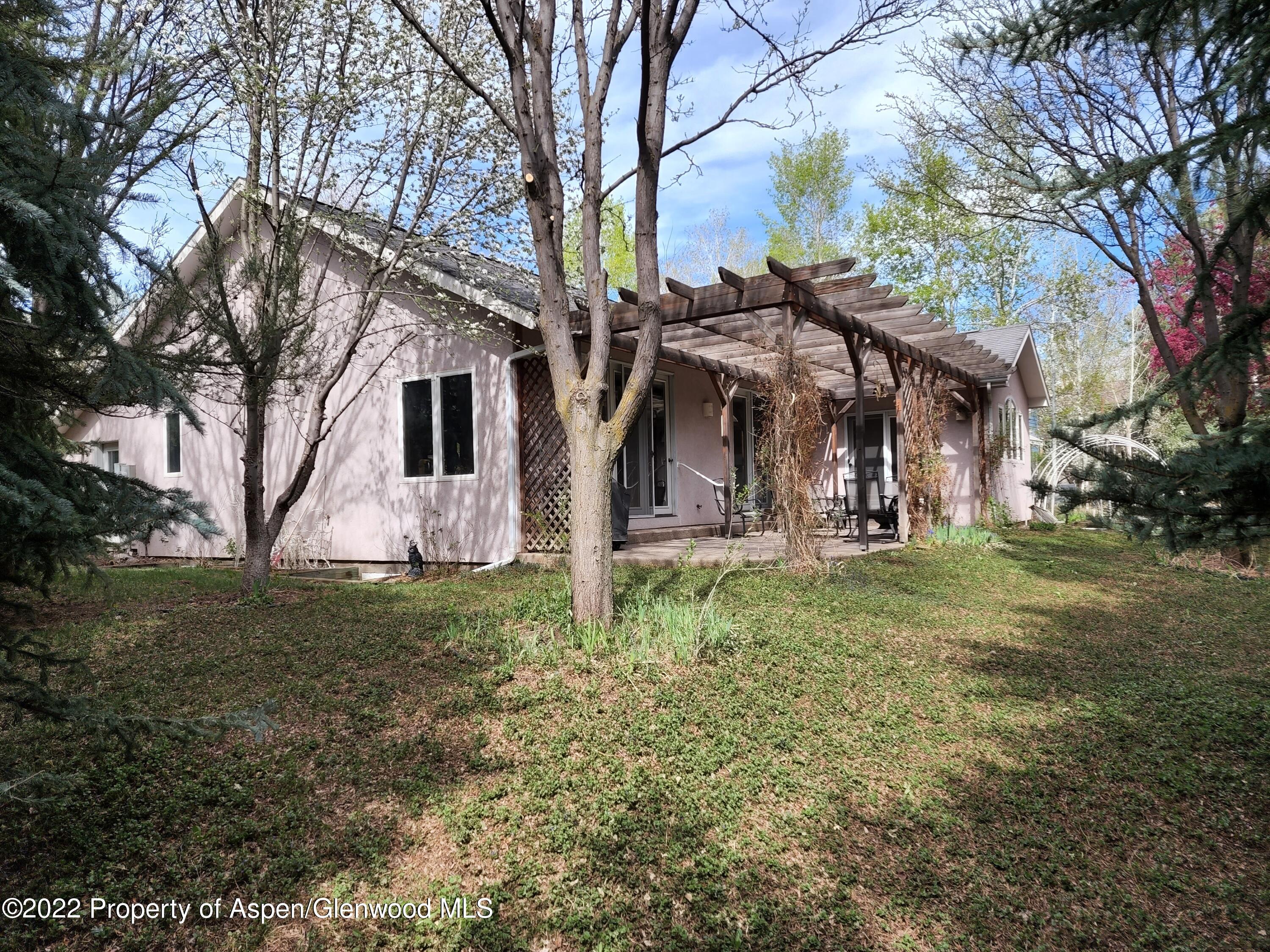 751 Latigo Loop Carbondale, CO 81623 - Photo 29 of 44 a view of a house with a yard