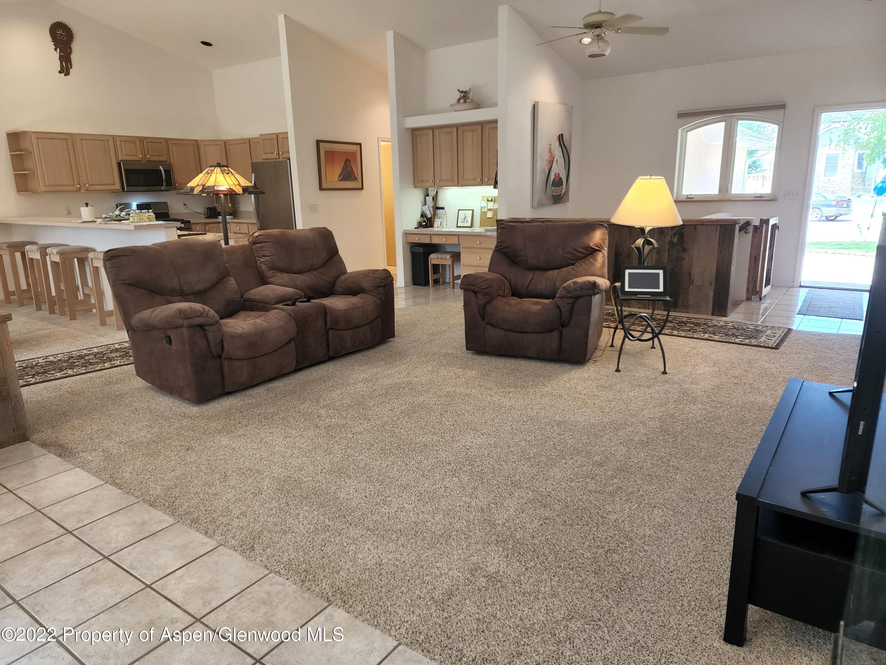 751 Latigo Loop Carbondale, CO 81623 - Photo 6 of 44 a living room with furniture fireplace and a window
