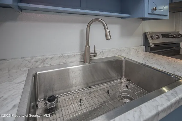 a close view of sink and tap