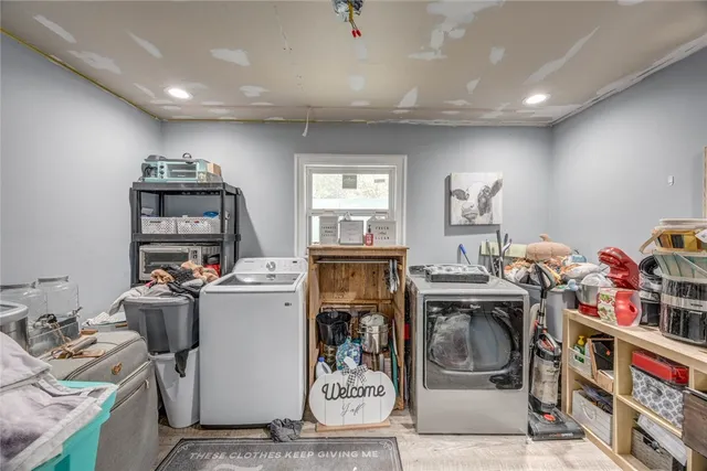 a storage room with washer and dryer