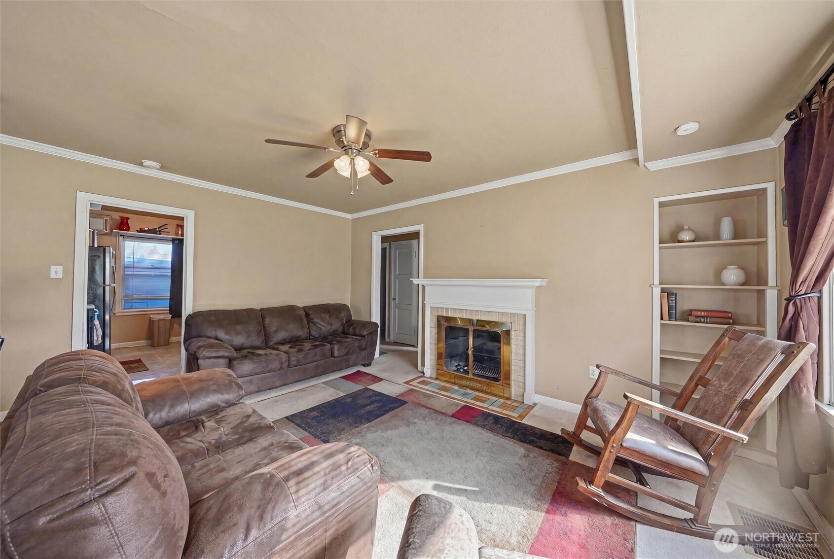 204 E Street Southwest Ephrata, WA 98823 - Photo 3 of 31 a living room with furniture a fireplace and a flat screen tv