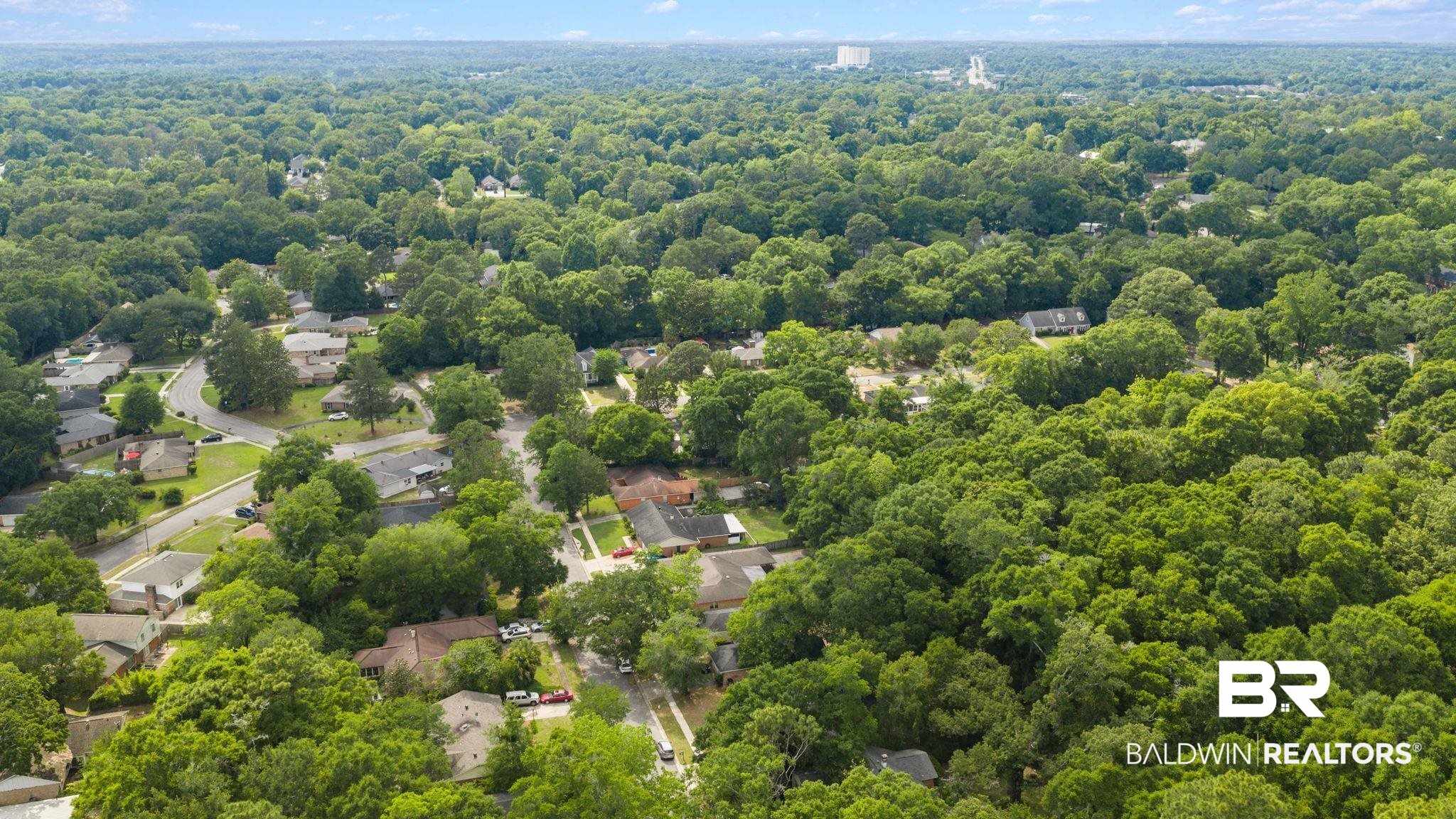 4724 Wicker Way Mobile, AL 36609 - Photo 34 of 36 Aerial perspective showcasing a verdant residential area with mature tree canopies