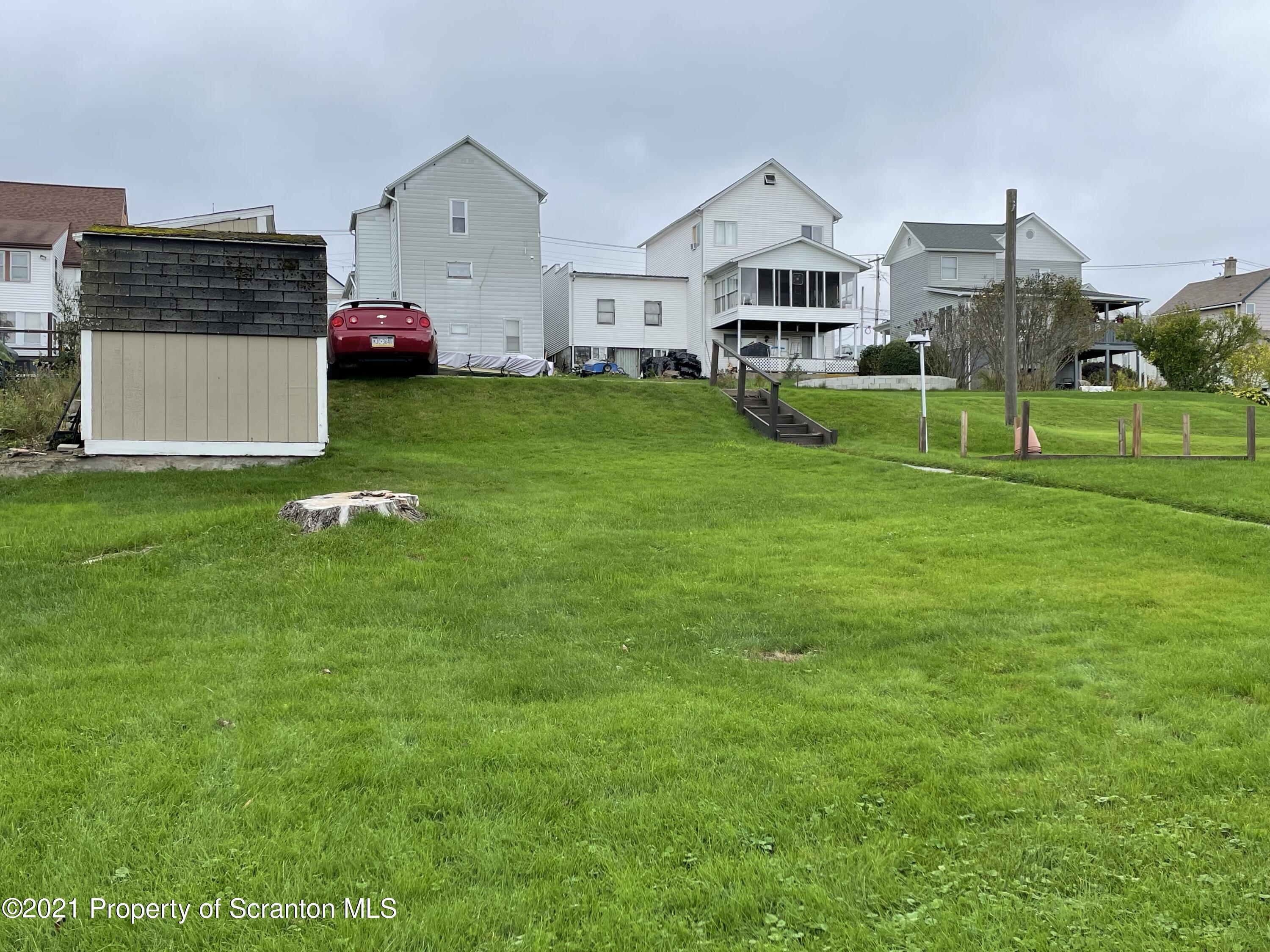 425 Clinton Street Vandling, PA 18421 - Photo 26 of 32 a front view of house with yard and green space