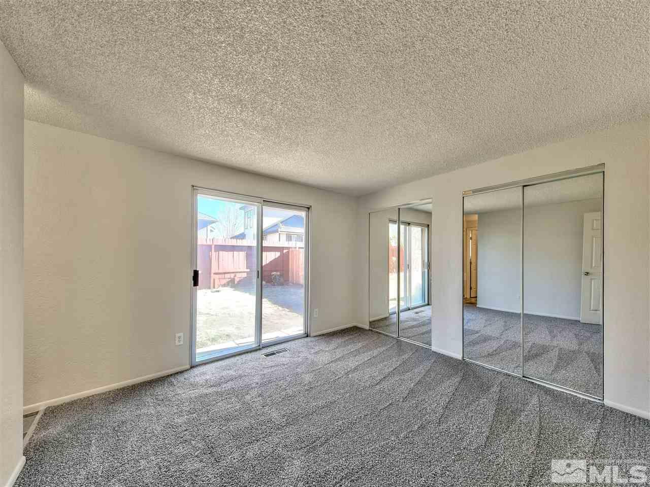 7460 Berryhill Drive Reno, NV 89511 - Photo 13 of 23 an empty room with windows