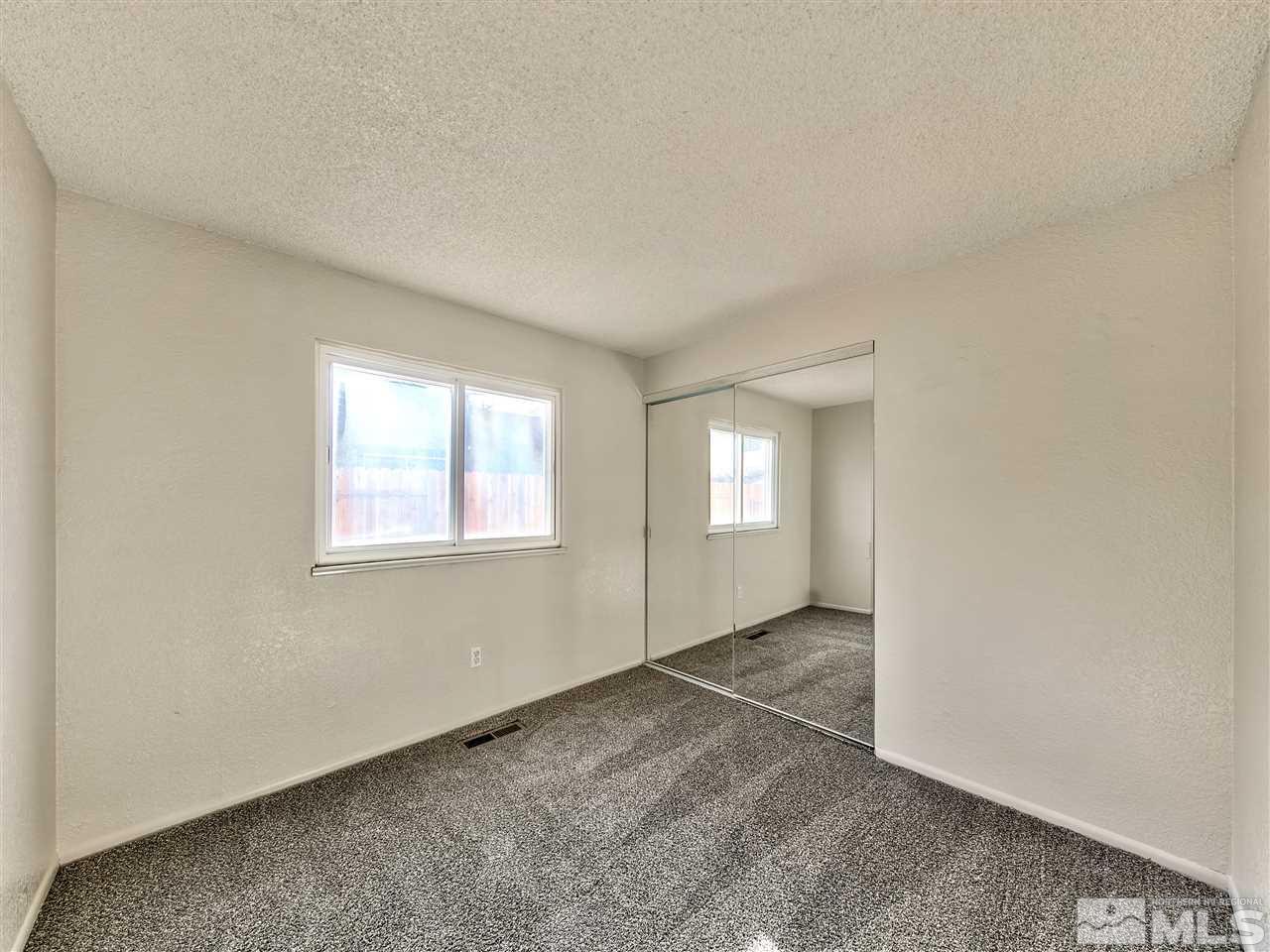 7460 Berryhill Drive Reno, NV 89511 - Photo 17 of 23 an empty room with windows