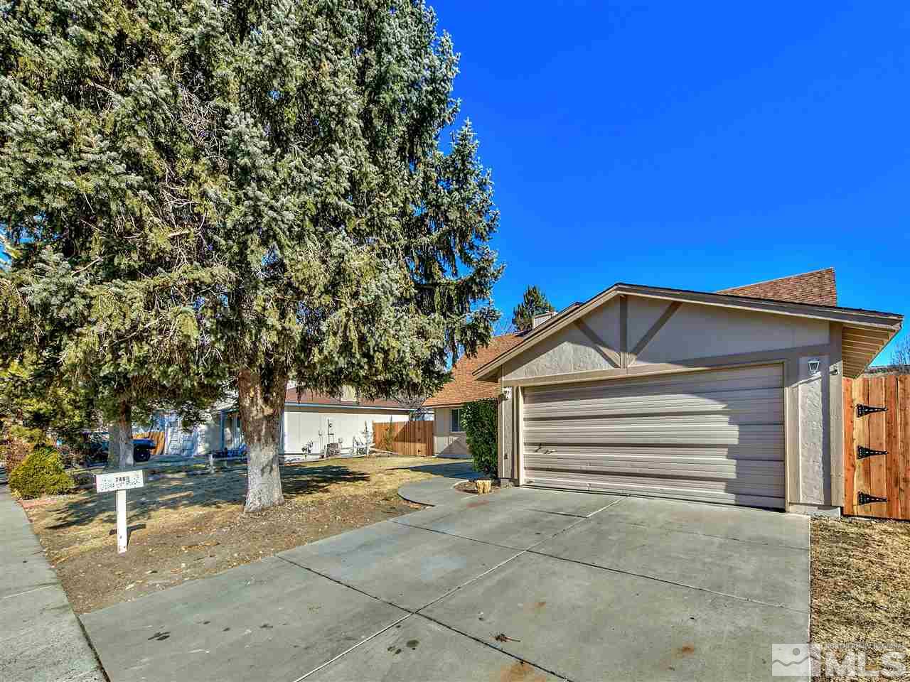 7460 Berryhill Drive Reno, NV 89511 - Photo 2 of 23 a view of a house with a yard