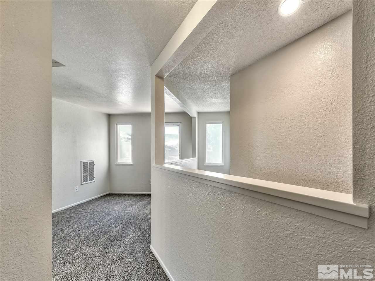7460 Berryhill Drive Reno, NV 89511 - Photo 21 of 23 an empty room with windows