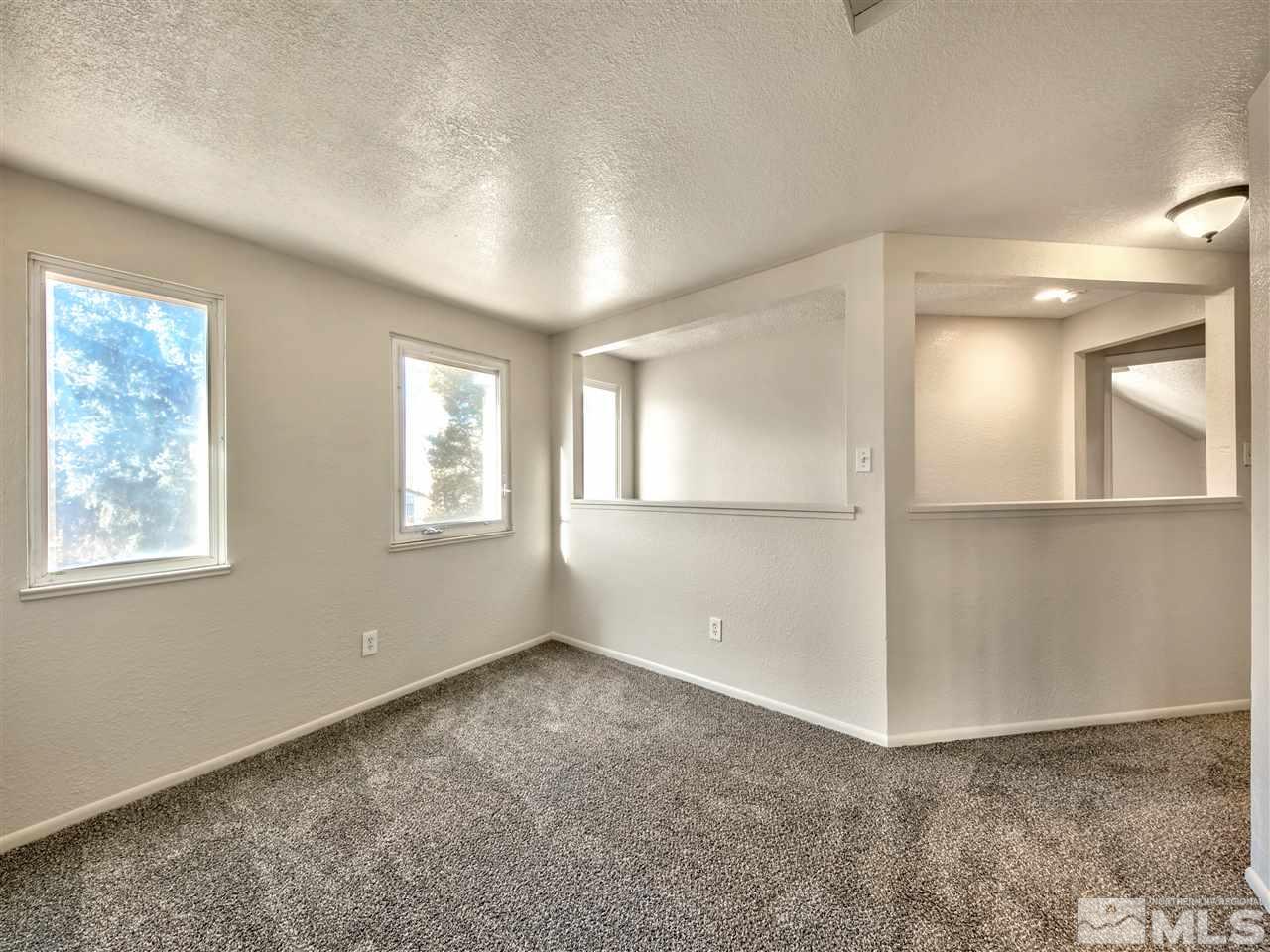 7460 Berryhill Drive Reno, NV 89511 - Photo 22 of 23 a view of an empty room with a window