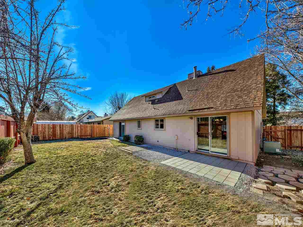 7460 Berryhill Drive Reno, NV 89511 - Photo 3 of 23 a view of a house with a yard
