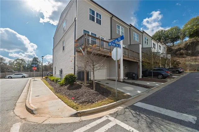 a view of a house with a street
